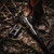 The Bounty Hunter Thompson Center Contender G2 Stock & Arm Brace on a rifle displayed with accessories. Product made by Midwest Industries.