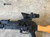 A Gen 2 AK Side Mount with an ACOG Interface attached to a rifle. Product made by Midwest Industries.