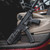 The Taurus RPC SD M-LOK® Handguard on a rifle that’s lying on a car seat. Product made by Midwest Industries.