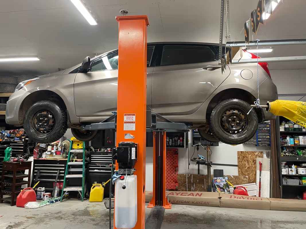 10,000-lb Two Post Floor Plate Auto Lift, Symmetric Arms, 77" Lift Height, Dual-Point Lock Release, TMG-TPL45 TMG Industrial