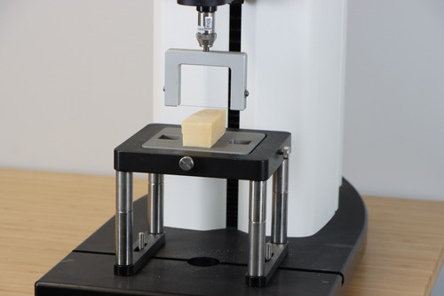 Wire Shear Plate cuts through the sample. Good for products with significant stickiness like cheese and butter.