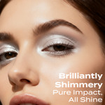 Model wearing Sweet Face Minerals Optimism eye shadow, showcasing a radiant white shimmer eye look with a smooth, light-reflective finish.