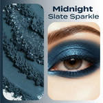Close-up of Smolder loose mineral eyeshadow showing its finely milled, metallic slate blue texture alongside a model wearing the shade on the eyelid for a bold, reflective finish.