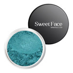 An open jar of Sweet Face Minerals Tasmania Eye Shadow showing finely milled teal mineral pigment with a subtle turquoise shimmer, paired with the brand’s black logo lid on a clean white background.