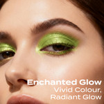 Close-up eye makeup look wearing Enchanted Eye Shadow, showcasing a bright emerald green shimmer with a smooth, radiant finish.
