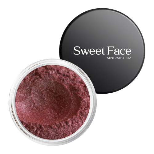 Sweet Face Minerals Edgy Eye Shadow loose mineral eyeshadow shown in an open jar with deep wine-berry shimmer.