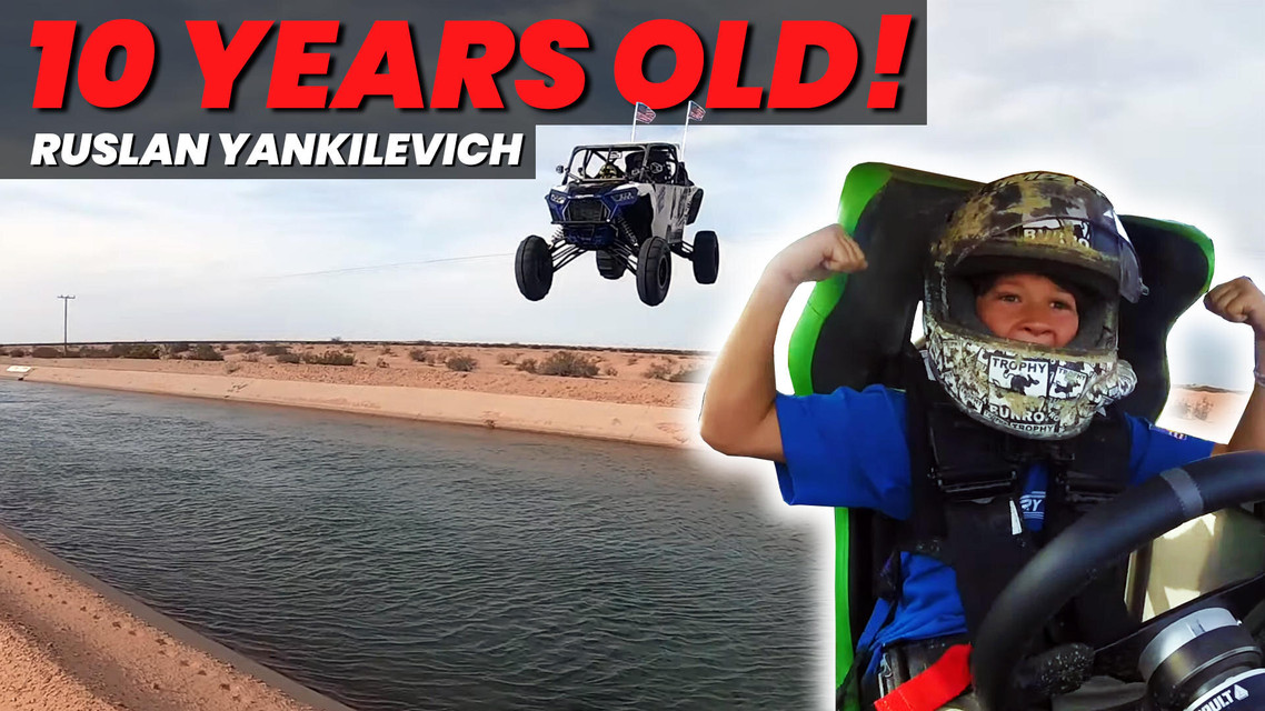 10 Year Old Ruslan Jumps Glamis Dunes, California Canal In Polaris RZR