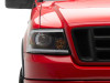 Raxiom 04-08 Ford F-150 Axial Series Projector Headlights w/ SEQL LED Bar- Blk Housing (Clear Lens) - T566364 Photo - Close Up