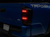 Raxiom 16-23 Toyota Tacoma ST LED Tail Lights- Black Housing- Smoked Lens - TT42787 Photo - Primary