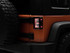Raxiom 07-18 Jeep Wrangler JK Axial Series Vision LED Tail Lights- Blk Housing (Clear Lens) - J130809 Photo - Primary