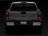 Raxiom 01-13 Chevrolet Silverado/GMC Sierra 1500 Axial Series LED License Plate Lamps- Smoked - S122507 Photo - Close Up