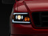 Raxiom 04-08 Ford F-150 Axial Series Projector Headlights w/ SEQL LED Bar- Blk Housing (Clear Lens) - T566364 Photo - Primary