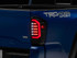 Raxiom 16-23 Toyota Tacoma Axial Series LED Tail Lights- Black Housing- Smoked Lens - TT36288 Photo - Primary
