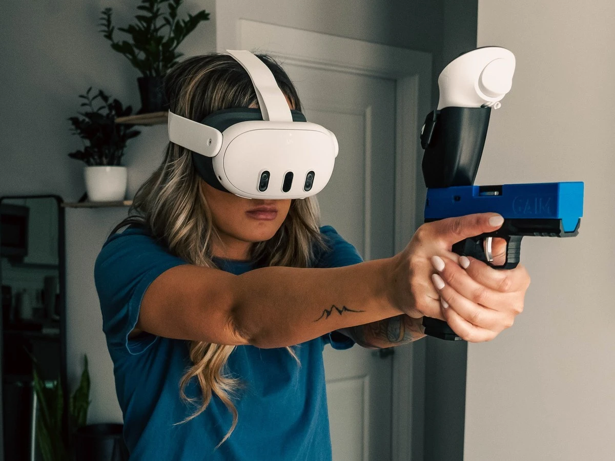 New shooter practicing with a GAIM pistol trainer at home