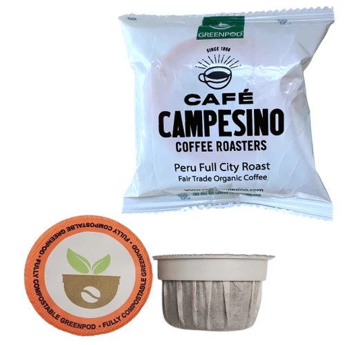 Wrapped and unwrapped Peru Full City Roast GreenPods coffee pods, labeled fully compostable