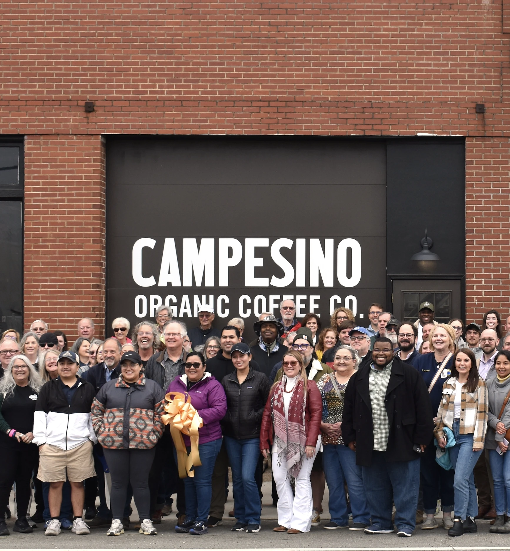Cafe Campesino Signpost with coffee country and partners