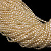 Freshwater Pearl 4x3mm Rice Smooth Cut Cream Color 15.3 inch Strand