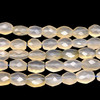 Chalcedony Gemstone 9x7-11x10mm Oval Facet Cut VS Clarity Cream Color Beads Strand