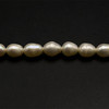 Freshwater Pearl Ivory Drop Oval VVS Clarity 7x5mm 56 Pcs Strand Encouraging Harmony and Emotional Healing