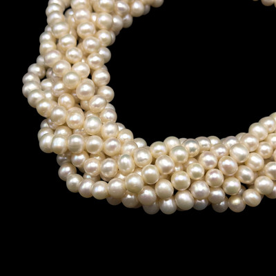 Freshwater Pearl 7x6mm Button Smooth Cut Cream Color 16" Strand