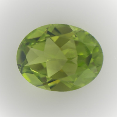 Natural Peridot Oval Faceted Cut 9X7mm Parrot Green Color VVS Clarity Loose Gemstone