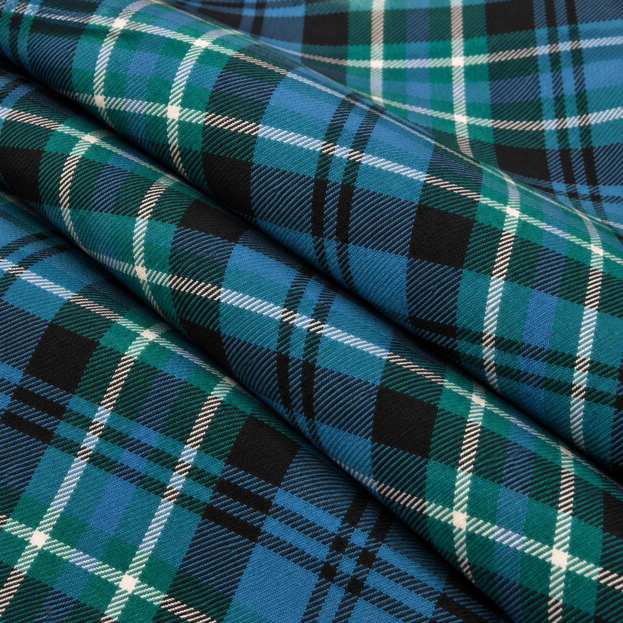 Arbuthnot Ancient lightweight tartan fabric arranged in folds