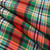 Dundee Old Ancient lightweight tartan fabric arranged in folds