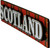 3D Fridge Magnet Scotland Banner Scottish Souvenir Gift on Red Tartan background 3D Fridge Magnet Scotland Banner Scottish Souvenir Gift on Red Tartan background