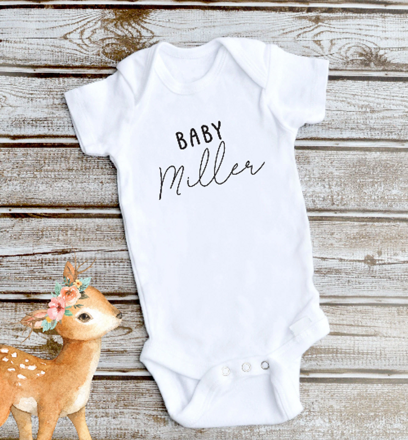 Customize this cute baby onesie body suit with the last name of the family or the baby's first name.