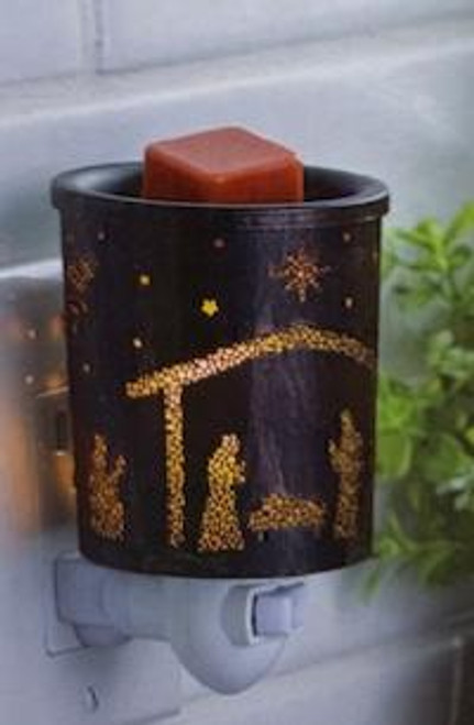 The Nativity Pluggable Fragrance Warmer brings festive cheer to any space. Featuring Holy Night Nativity scene, it’s perfect for adding a soft glow to a bathroom, office, or bedroom. Just plug it into any outlet to gently warm your favorite holiday scents. It’s a must-have for your home and also makes a thoughtful gift for family or friends.

this includes warmer with rotating base, NP7 warming bulb and 1-year limited factory warranty. Plug is compatible US outlets and is 15 watts. It measures 5" tall and 3.5" wide and 2.75 in depth.