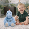 Personalized blue dinosaur stuffed animal with embroidered custom name for baby shower and nursery keepsake gift