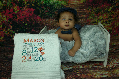 Personalized Fox Baby Quilt with birth Stats embroidered on quilt.