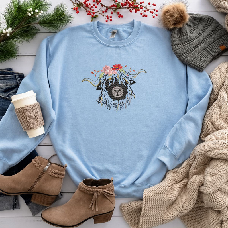 Black Nose Sheep Sweatshirt Embroidered on Baby Blue