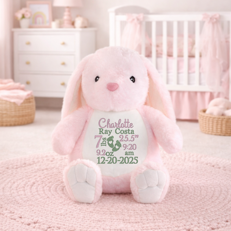 Personalized pink bunny birth announcement stuffed animal with embroidered birth stats on belly