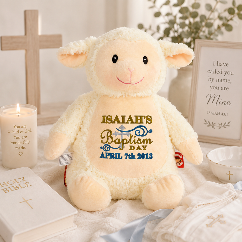 Personalized baptism lamb stuffed animal embroidered with a child’s name, cross and baptism date