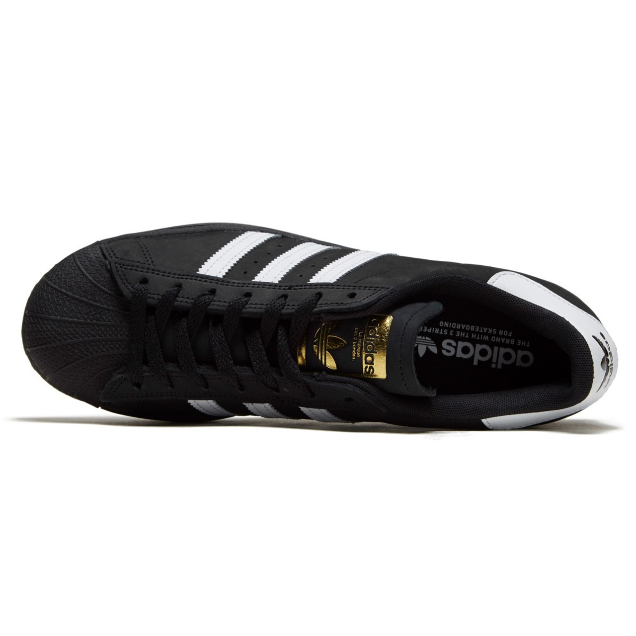 black adidas shell toe shoes