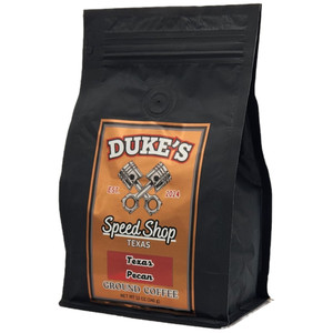 Texas Pecan flavored coffee in a black 12oz bag from Dukes Speed Shop Texas.