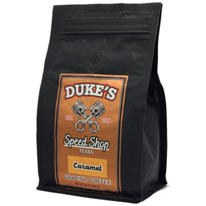 Caramel flavored coffee in a black 12oz bag from Dukes Speed Shop Texas.