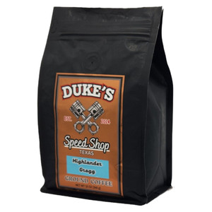 Highlander Grogg flavored coffee in a black 12oz bag from Dukes Speed Shop Texas.