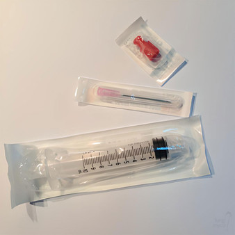 Sealed pre-sterilised luer lock syringe, cap and needle at Fungi Myco