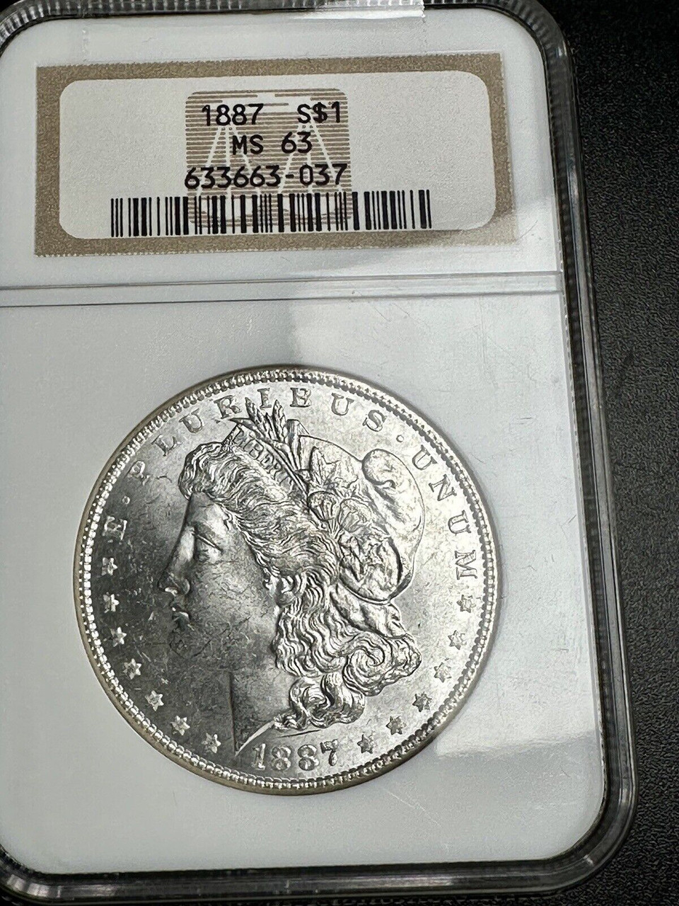 1887 Morgan Silver Dollar NGC MS63 - Brilliant Luster High-Grade