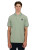 Model wearing Sandbanks Sage Badge Logo Poloshirt