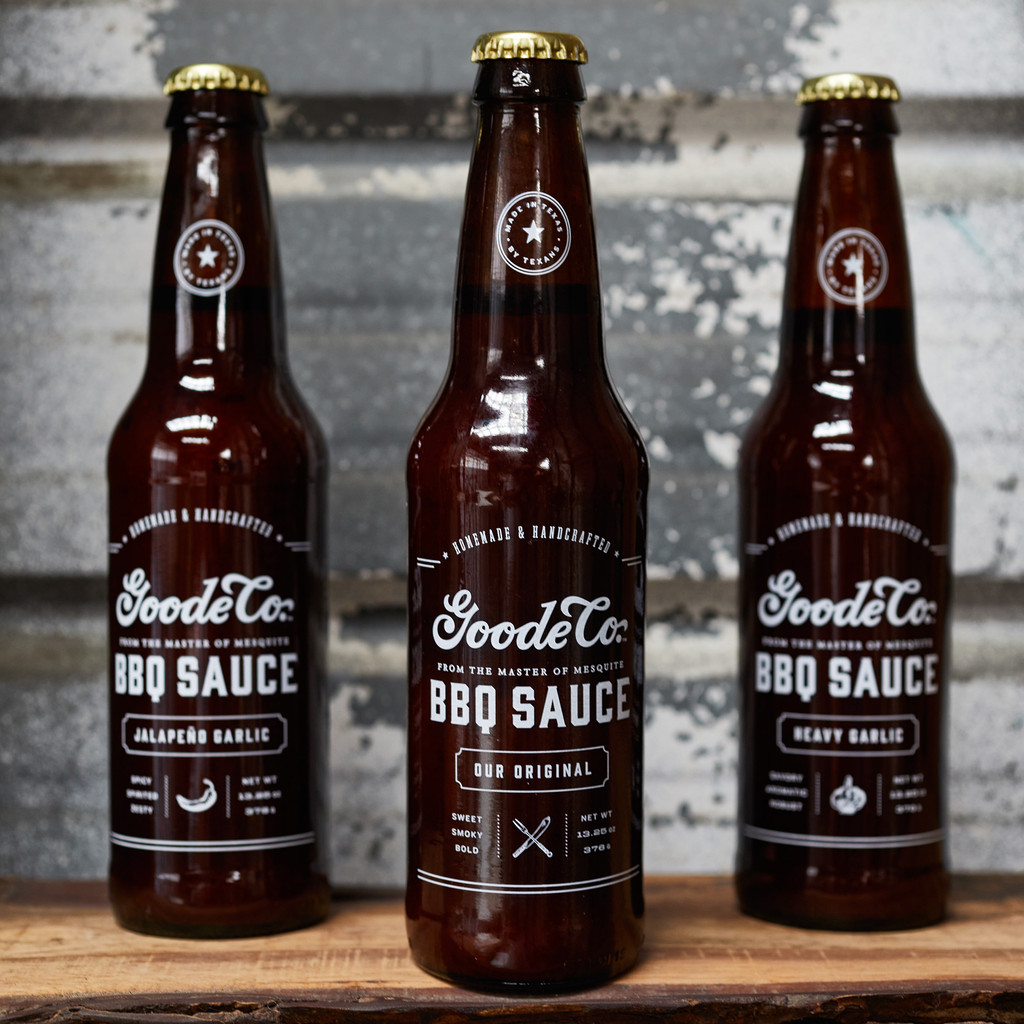 3 bottle set of Goode Co's 13.5-ounce longneck beer bottle of Original, Jalapeño, and Heavy Garlic BBQ sauces.