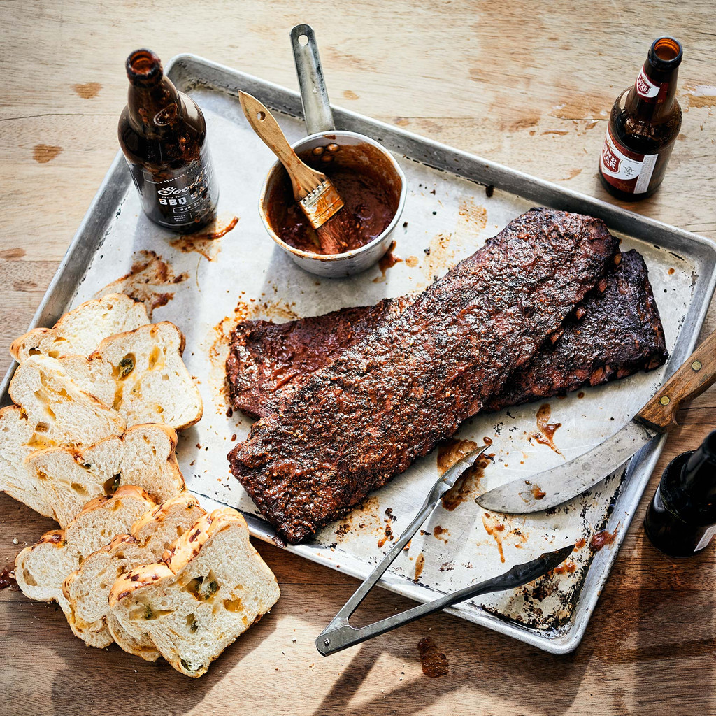 Goode Co's Slow-Smoked BBQ Ribs, 1 bottle of BBQ Sauce, and 1 loaf of Jalapeño Cheese Bread.