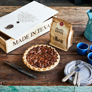 Texas Style Coffee Break Gift Box, with one 12-ounce bag of Chuckwagon coffee and one 8-inch Pecan Pie, packaged in a branded pine gift box.