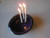 Tamara S Gordon Ceramics. Three candle holding pot - - huh?