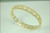 Capri- Gold & Sparkle-round bangle in sterling silver, 18K plate & CZ