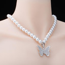 Ladies High Fashion Vintage Look White Pearl Necklace Flooded Ice Butterfly Pendant Charm