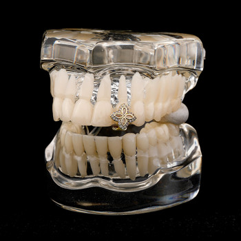 Transform Your Look with The Lotus: Exploring VVS Diamond CZ Flower Child Iced Grillz in Hip Hop Fashion