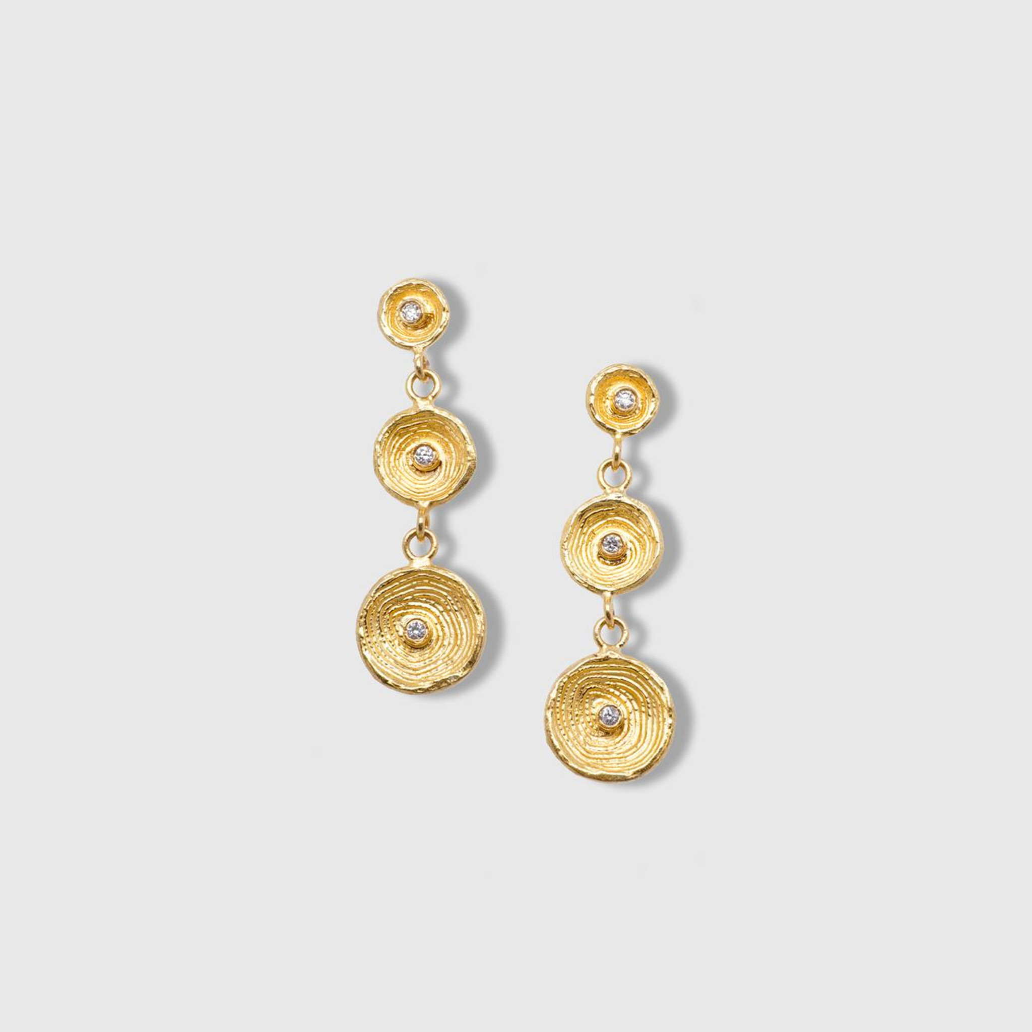 Prehistoric Works Circle of Life Earrings with Diamond Detail, 24kt Yellow Gold 